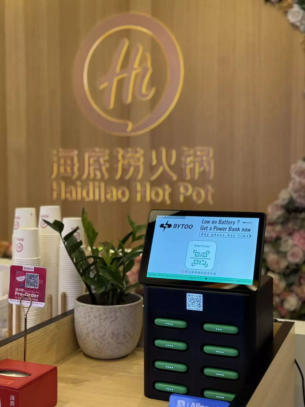 shared power bank station in restaurant